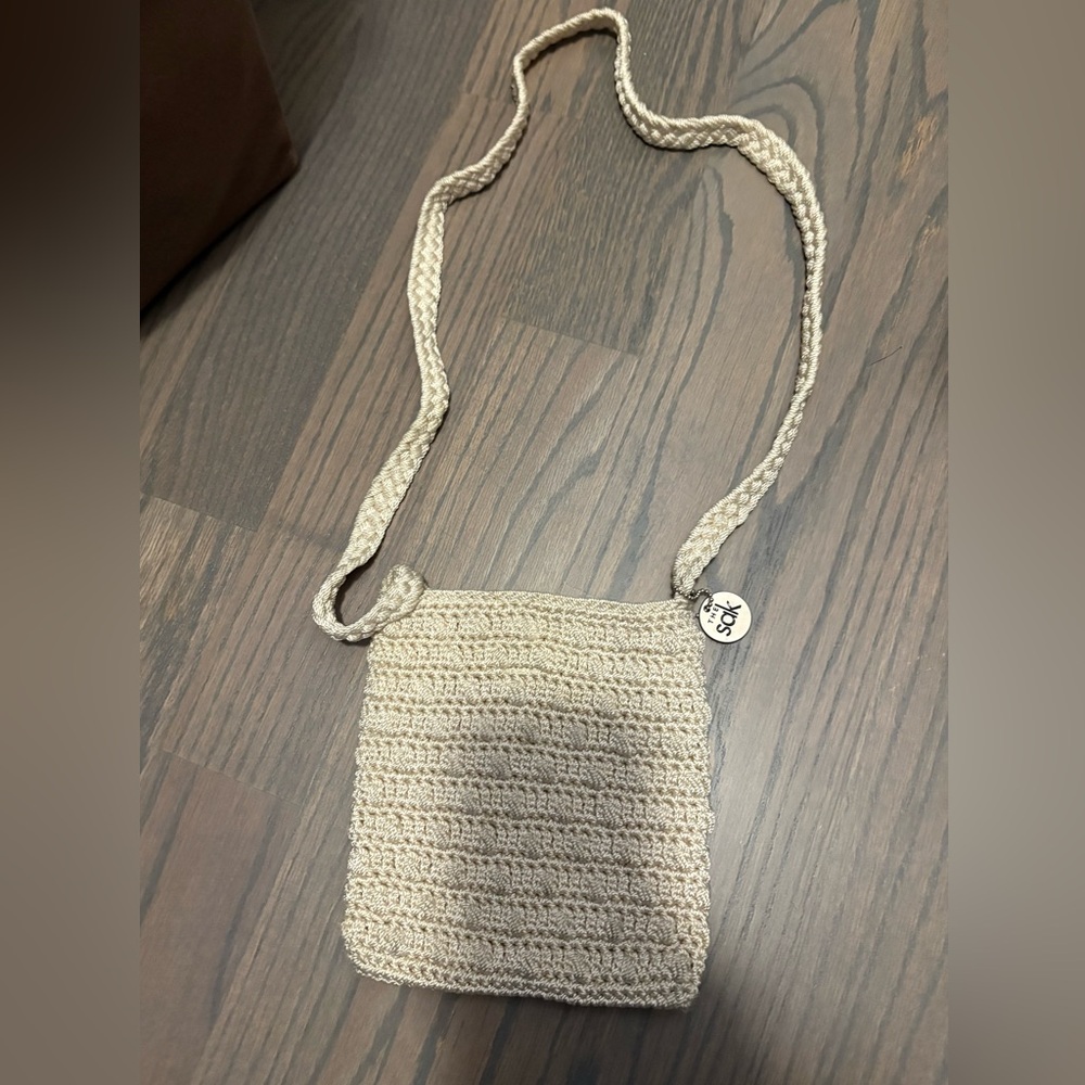 The Sak Beige Crochet Crossbody Bag Over the Shoulder